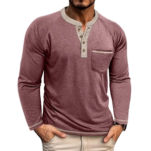 Detail of dark red henley shirt featuring grey contrast stitching and four wood buttons