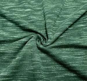 Macro shot of dark green heathered knit fabric with soft texture and refined grain
