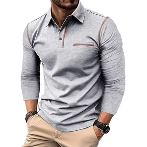 Detail of grey men's long sleeve Polo shirt showing contrast brown stitching and pocket seams