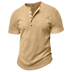 Detail view of khaki Henley shirt with five-button placket and slub cotton texture