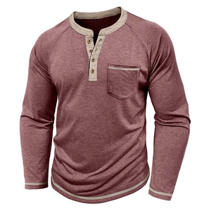 Detailed close-up of burgundy Henley shirt with grey contrast trim and wood buttons