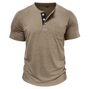 Detail of khaki Henley shirt showing contrast three-button placket and chest pocket texture