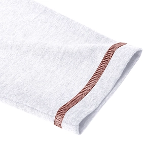 Detail of grey knitted polo cuff featuring contrast brown decorative double stitching