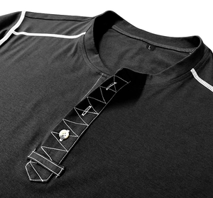Detail view of black Henley shirt neckline with white contrast stitching and buttons