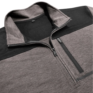 Detail view of quarter-zip stand collar sweatshirt with vertical chest pocket