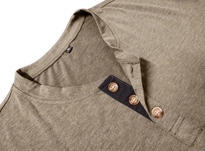 Macro detail of the Henley shirt neckline with 3 buttons and knitted fabric texture