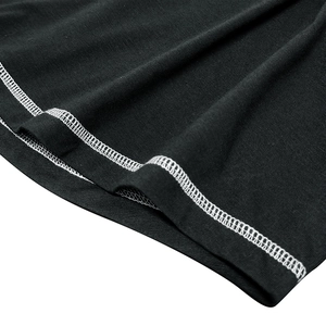 Detail view of high-quality knit fabric with precise white contrast stitching on black hem