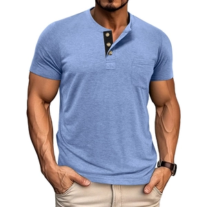 Detail of light blue Henley shirt showing three-button placket and front chest pocket