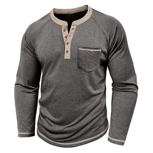 Detail of grey men's long sleeve Henley shirt with contrast stitching and chest pocket