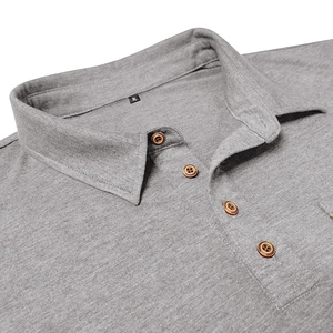 Macro shot of grey waffle knit fabric with brown buttons and XL size label on polo shirt