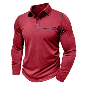 Close-up of brick red long sleeve polo shirt featuring grey zipper pocket and stitching