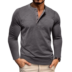 Detail of grey Henley shirt featuring long sleeves and classic buttoned neckline texture