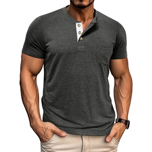 Detail of grey men's Henley shirt featuring contrast button placket and chest pocket