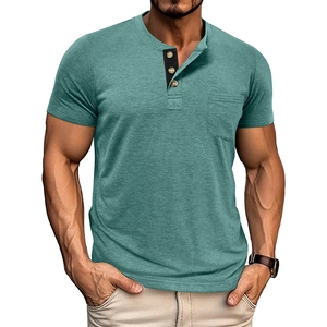 Detailed view of teal short sleeve Henley shirt with three-button contrast placket and pocket