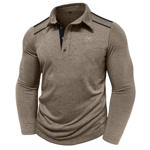 Detailed view of brown long sleeve polo shirt with textured knit and black shoulder stripes