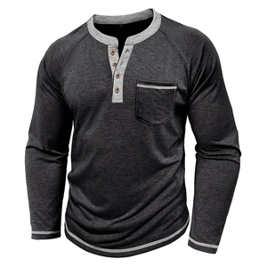 Detail of grey Henley shirt showing knit texture, contrast trim, and buttoned chest pocket