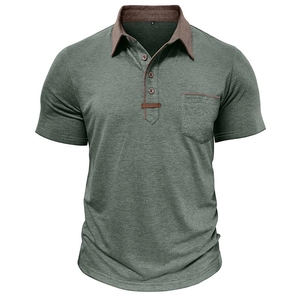 Detail view of moss green polo shirt featuring contrast brown collar and chest pocket trim