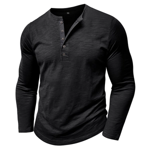 Detail of black long sleeve Henley shirt featuring slub texture and button placket