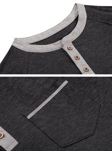 Detail of grey Henley shirt with contrast stitching, wooden buttons and collar texture