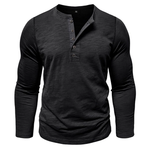 Detail of grey slub fabric texture and buttoned Henley neckline on men's long sleeve top