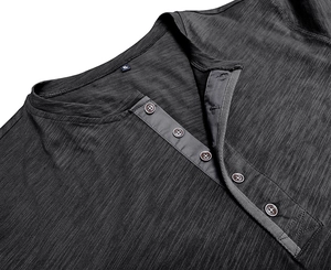 Close-up detail of dark grey Henley shirt neckline with buttons and slub knit texture