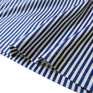 Detailed close-up showing the double-stitched hem and blue white striped fabric texture