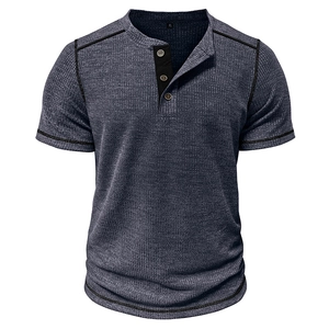 Macro detail of navy waffle knit Henley shirt with black contrast stitching and buttons