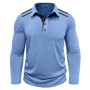 Close-up of light blue polo shirt collar with three buttons and black shoulder stripes