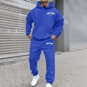 Detail view of Klein blue fleece hoodie and matching joggers with white New York text print