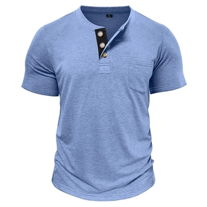 Detail of light blue short sleeve Henley shirt with wood buttons and chest pocket
