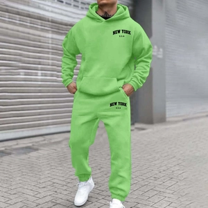 Macro detail of New York USA print on fluorescent green hooded sweatshirt and joggers