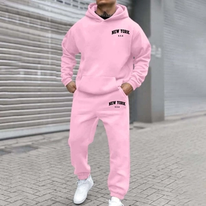 Detailed close-up of pink tracksuit sleeve cuff and New York USA logo printing