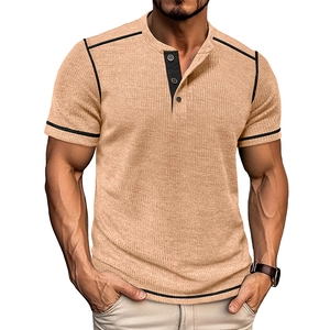 Detail of khaki waffle knit Henley t-shirt featuring black button placket and trim accents