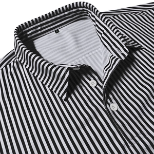 Detail of black and white striped polo shirt showing breathable fabric texture and collar
