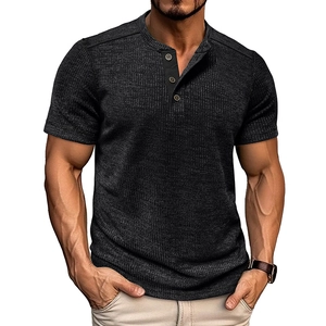 Detailed view of dark grey waffle knit fabric and three-button placket on Henley shirt