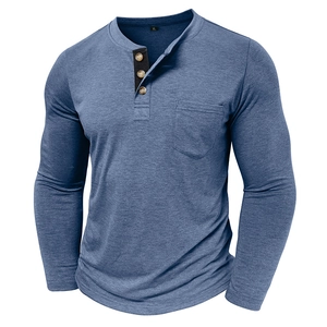 Detail of three-button Henley collar and pocket on dark blue long sleeve shirt