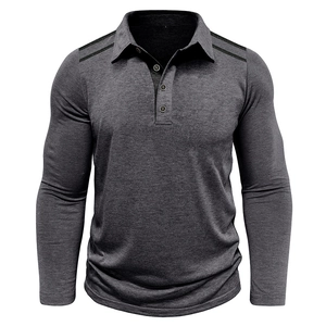 Detail view of dark grey long-sleeve polo shirt with contrast shoulder stripes and buttons