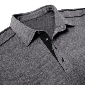 Macro view of grey knit fabric, collar construction and contrast black buttons on polo shirt