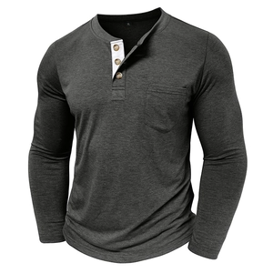 Detail of dark grey henley t-shirt featuring a white contrast placket and wood-style buttons