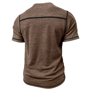 Detail of brown waffle knit t-shirt with black contrast stitching on the back
