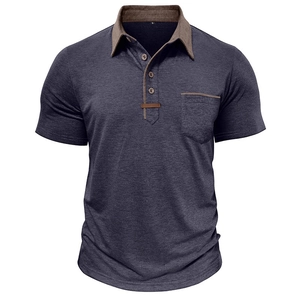 Close-up of contrast brown collar and pocket detail on grey knit polo shirt