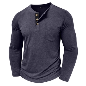 Detailed close-up of dark grey men's Henley shirt showing wood-style buttons and chest pocket