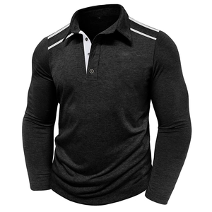 Close-up of charcoal grey men's polo shirt featuring white shoulder stripes and collar trim
