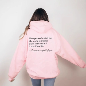 Felpa con cappuccio rosa oversize con spalle scese e stampa motivazionale sulla schiena
