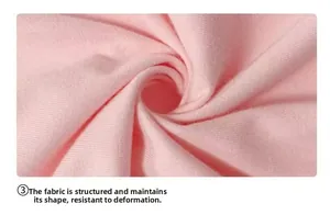 Close-up of soft pink ribbed cotton knit fabric showing thick texture and spiral pattern