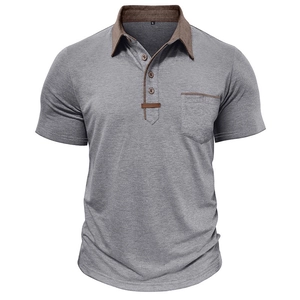 Close-up of grey polo shirt with brown contrast collar and chest pocket detail
