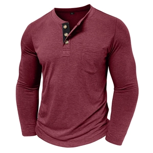Detail of burgundy long sleeve Henley shirt with three buttons and chest pocket design