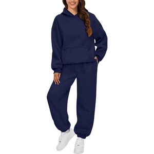 Detail of dark blue hoodie and jogger set with drawstring hood and kangaroo pocket