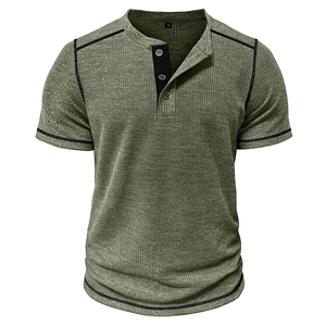 Detailed view of olive green waffle knit fabric and black buttons on men's Henley shirt