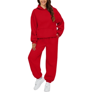 Detail of red hooded tracksuit set showing kangaroo pocket and elastic ribbed cuffs